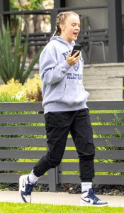 Jojo Siwa in a Grey Hoodie