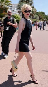 Julia Garner in a Black Mini Dress