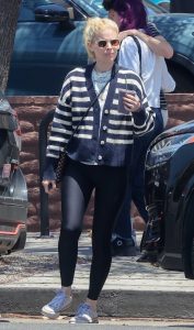 Kate Mara in a Striped Cardigan