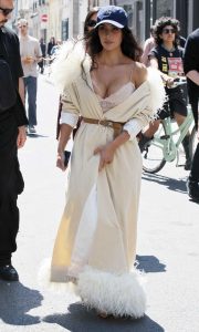 Kim Kardashian in a Beige Plunging Feathered Dress
