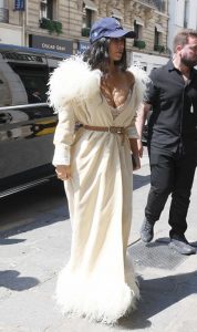 Kim Kardashian in a Beige Plunging Feathered Dress