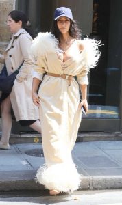 Kim Kardashian in a Beige Plunging Feathered Dress