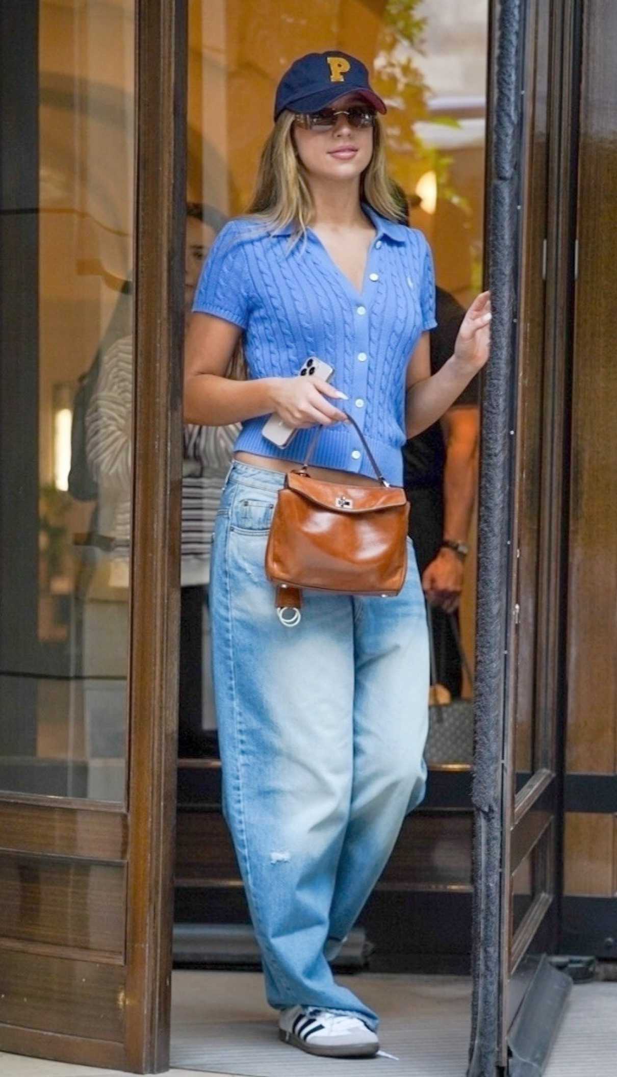 Tate McRae in a Blue Cardigan