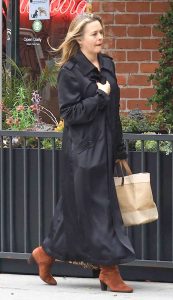 Alicia Silverstone in a Black Trench Coat