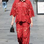 Ashley Roberts in a Red Lace Pantsuit Leaves the Heart Radio in London 06/25/2025