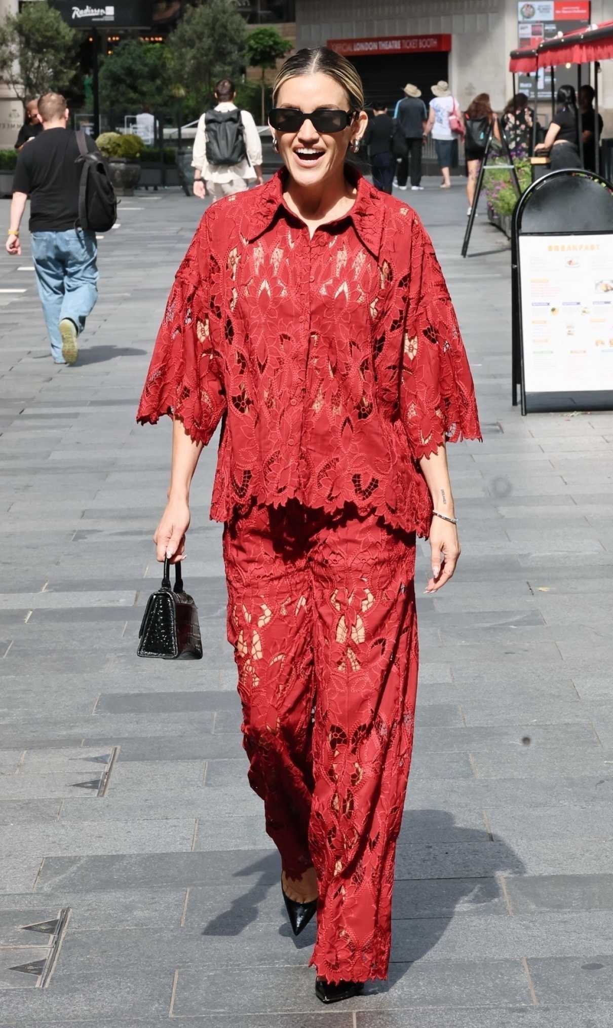 Ashley Roberts in a Red Lace Pantsuit