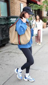 Dakota Johnson in a Black Cap