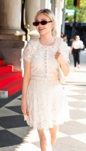 Emily Alyn Lind in a White Lace Dress