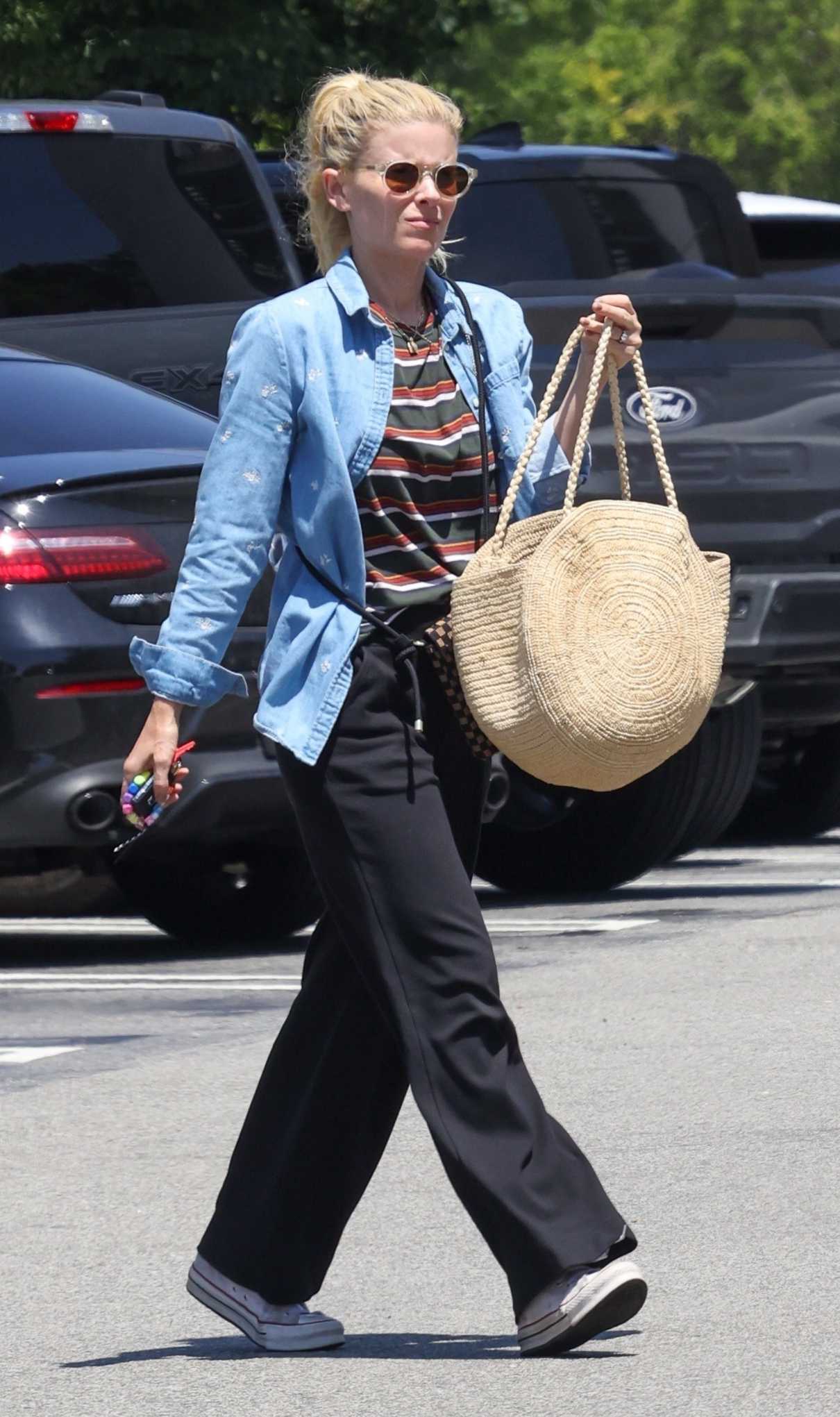 Kate Mara in a Blue Denim Shirt