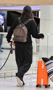 Nina Dobrev in a Black Cap