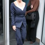 Sydney Sweeney in a Blue Pinstriped Pantsuit Leaves the Heart Breakfast Show in London 06/10/2025