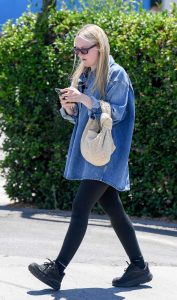 Dakota Fanning in a Black Leggings