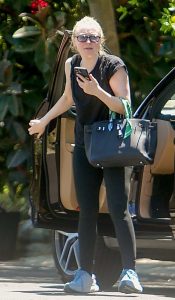 Dakota Fanning in a Black Tee