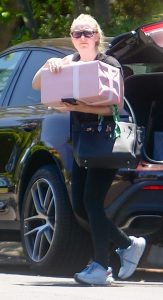 Dakota Fanning in a Black Tee