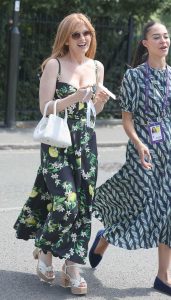 Isla Fisher in a Black Floral Dress