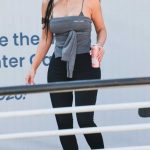 Kim Kardashian in a Grey Top Arrives at Airport in Venice 06/28/2025