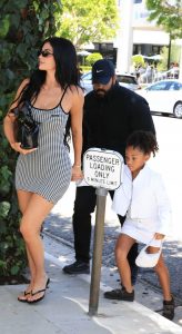 Kylie Jenner in a Plaid Form Fitting Mini Dress