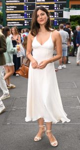 Monica Barbaro in a White Dress