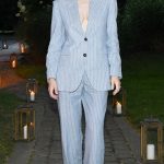 Alexandra Daddario in a Pinstriped Pantsuit Attends the Brunello Cucinelli Hamptons Dinner in Sagaponack 07/31/2025