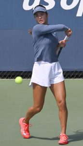 Emma Raducanu in a White Shorts