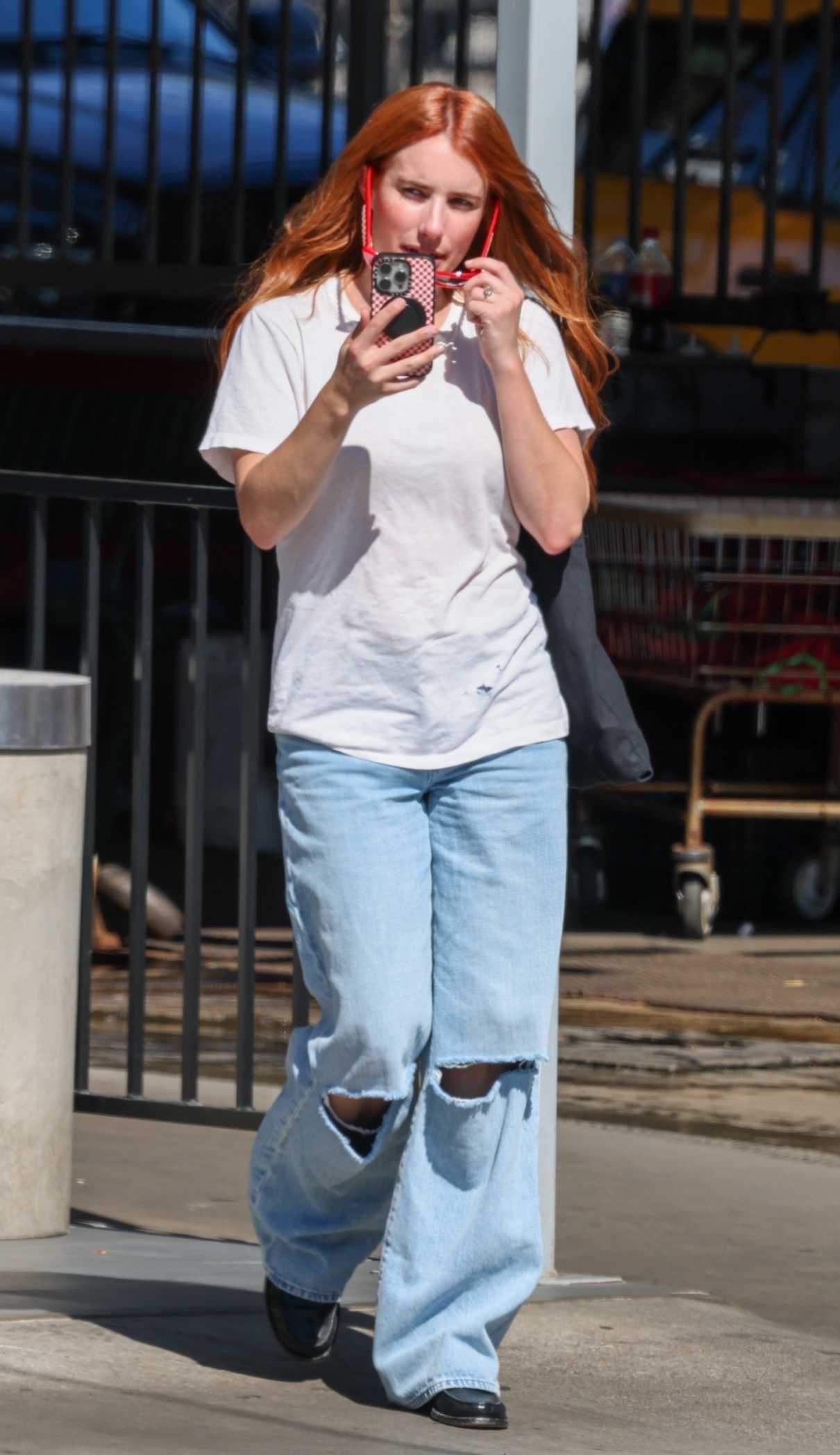 Emma Roberts in a White Tee