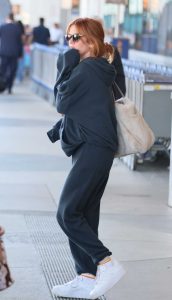 Isla Fisher in a Navy Sweatsuit
