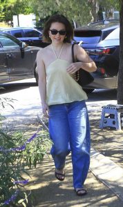 Kaitlyn Dever in a Yellow Top