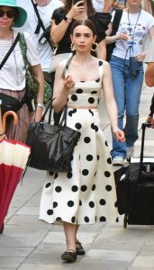 Lily Collins in a White Polka Dot Ensemble