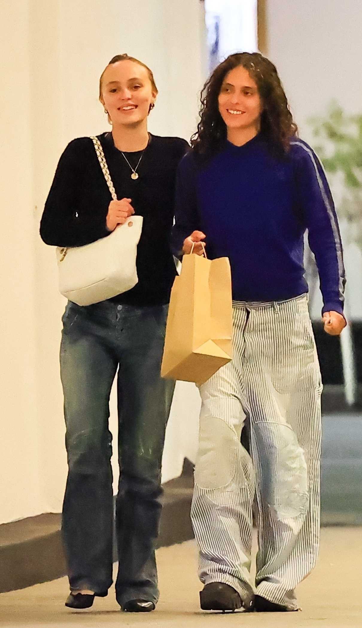 Lily-Rose Depp in a Black Sweatshirt