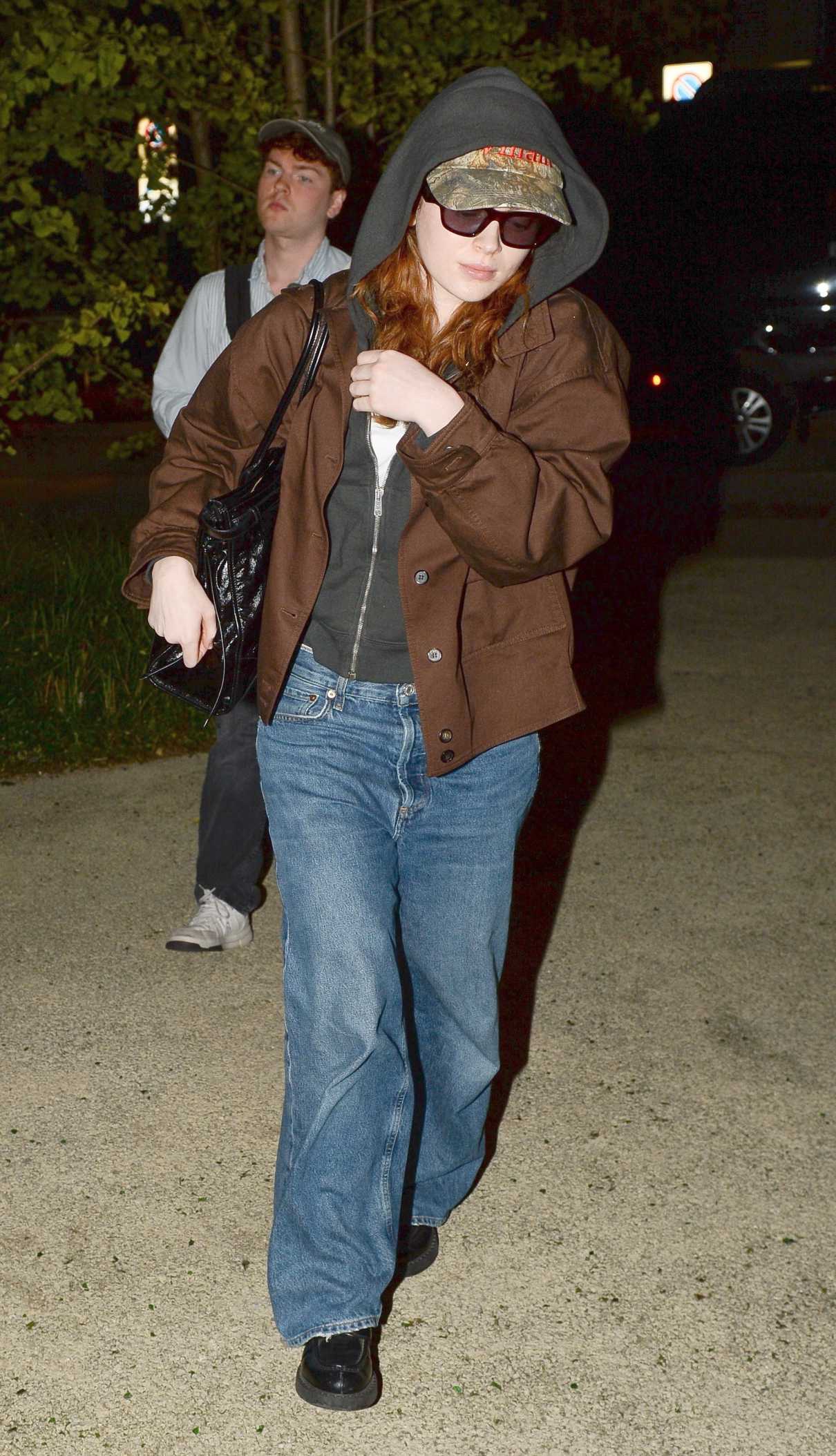 Sadie Sink in a Black Hoodie