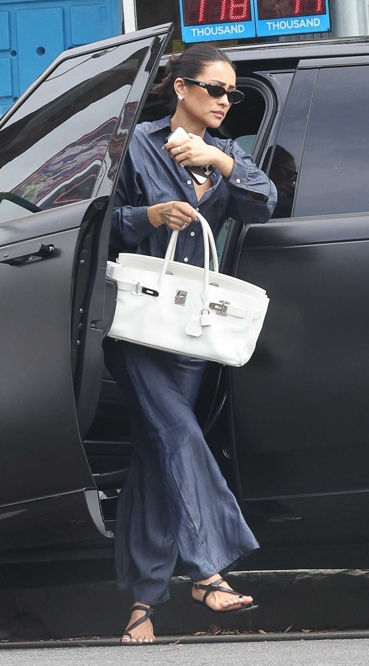 Shay Mitchell in a Blue Denim Pantsuit