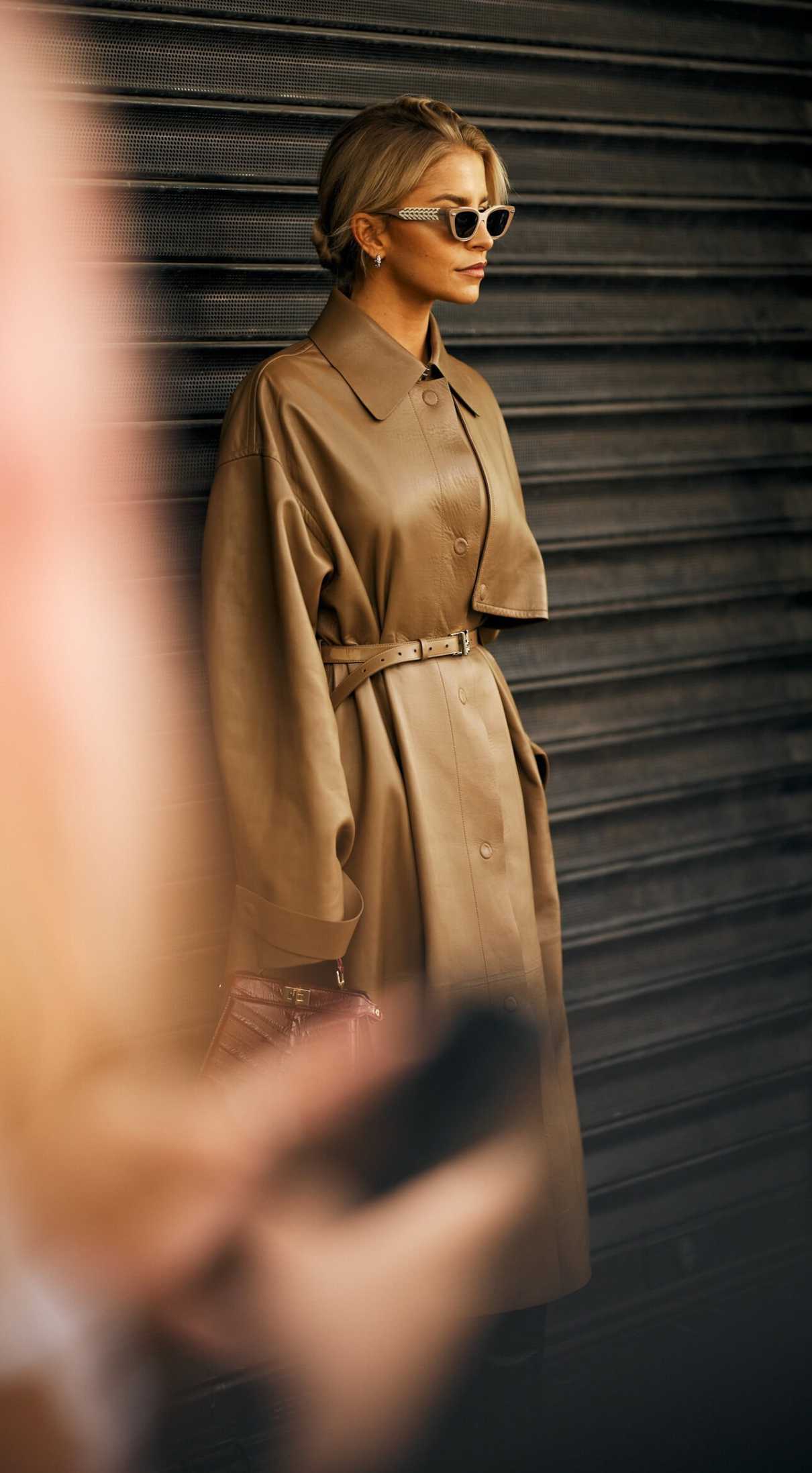 Caroline Daur in a Beige Leather Coat