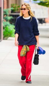 Jennifer Lawrence in a Red Track Pants