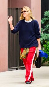 Jennifer Lawrence in a Red Track Pants
