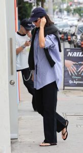 Kendall Jenner in a Black Flip-Flops