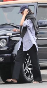 Kendall Jenner in a Black Flip-Flops