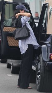 Kendall Jenner in a Black Flip-Flops