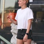 Kristen Stewart in a White Tee Lights Up a Cigarette After Lunching with Some Friends in Los Angeles 08/29/2025