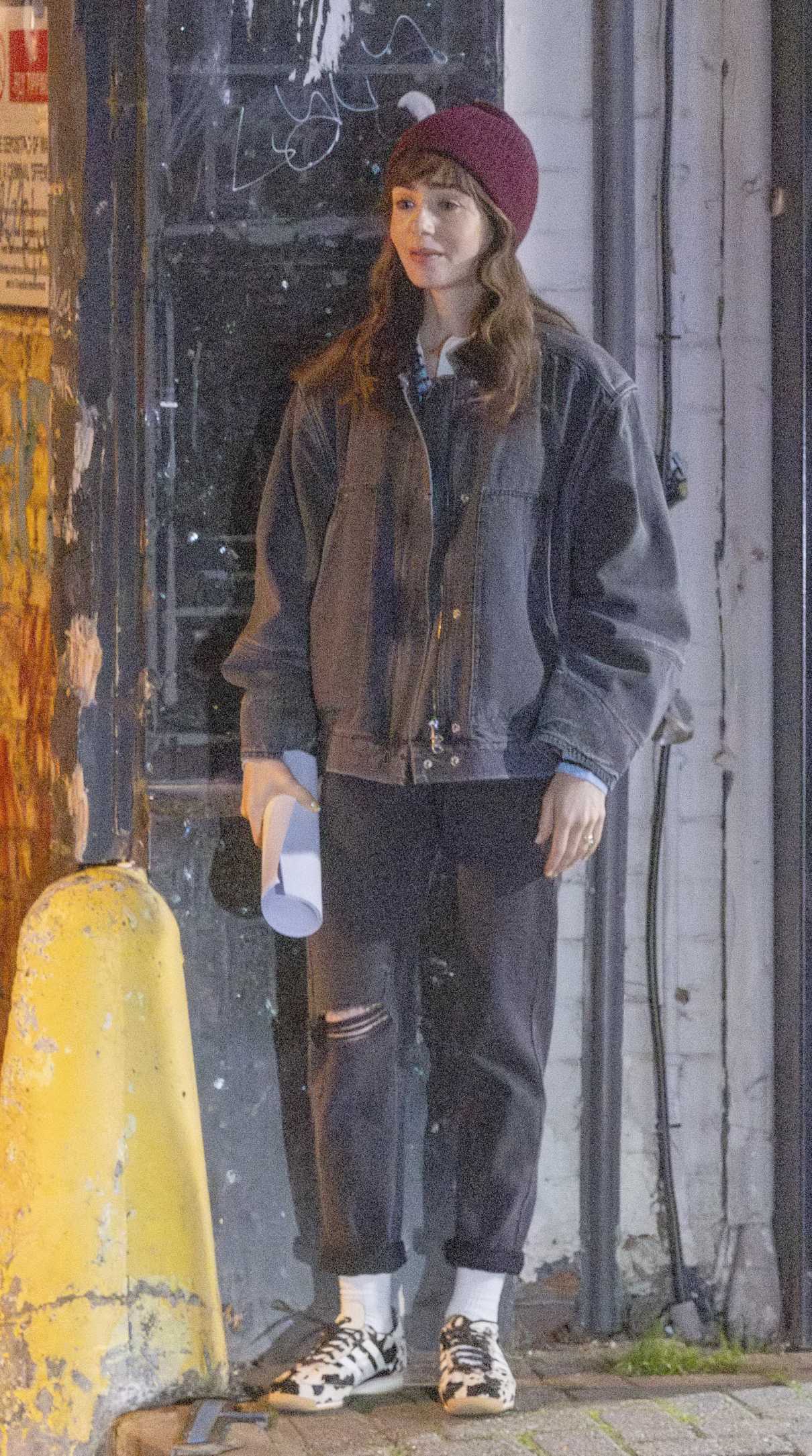 Lily Collins in a Black Denim Jacket