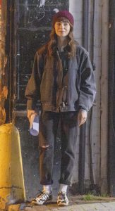 Lily Collins in a Black Denim Jacket