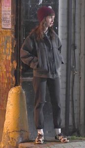 Lily Collins in a Black Denim Jacket