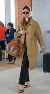 Mia Goth in a Beige Trench Coat