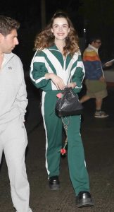 Kiernan Shipka in a Green Tracksuit
