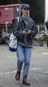 Lily Collins in a Black Leather Jacket