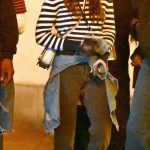 Olivia Rodrigo in a Striped Sweater Arrives at Universal Studios Halloween Horror Nights in Los Angeles 10/12/2025
