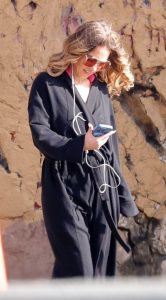 Sydney Sweeney in a Black Bathrobe