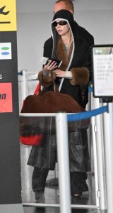 Anya Taylor-Joy in a Black Leather Coat