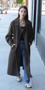 Caylee Cowan in a Brown Coat