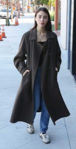 Caylee Cowan in a Brown Coat