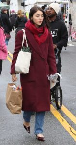 Caylee Cowan in a Burgundy Coat